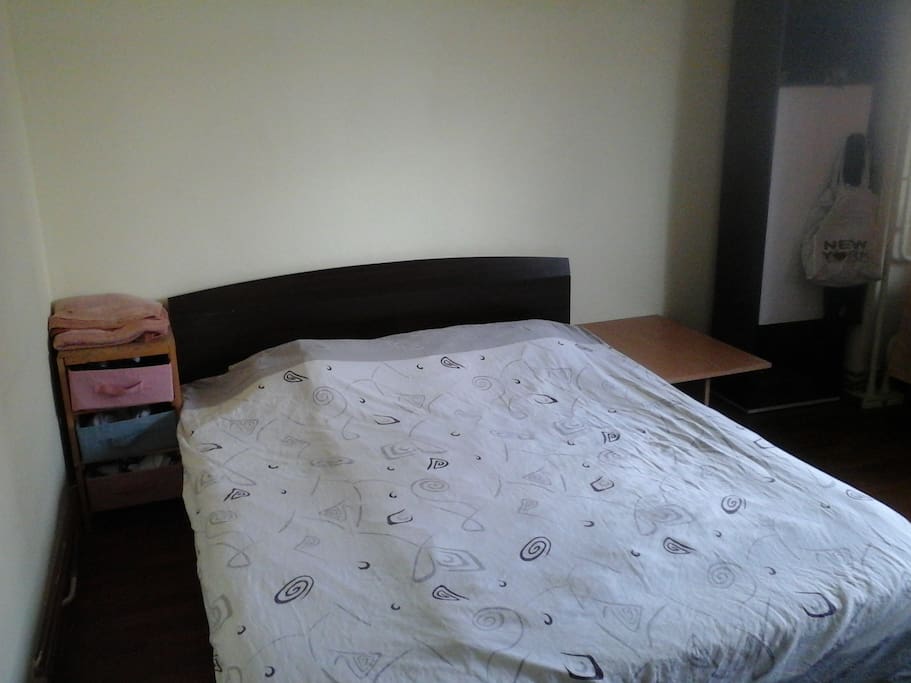 Bed, table and small drawers for clothes