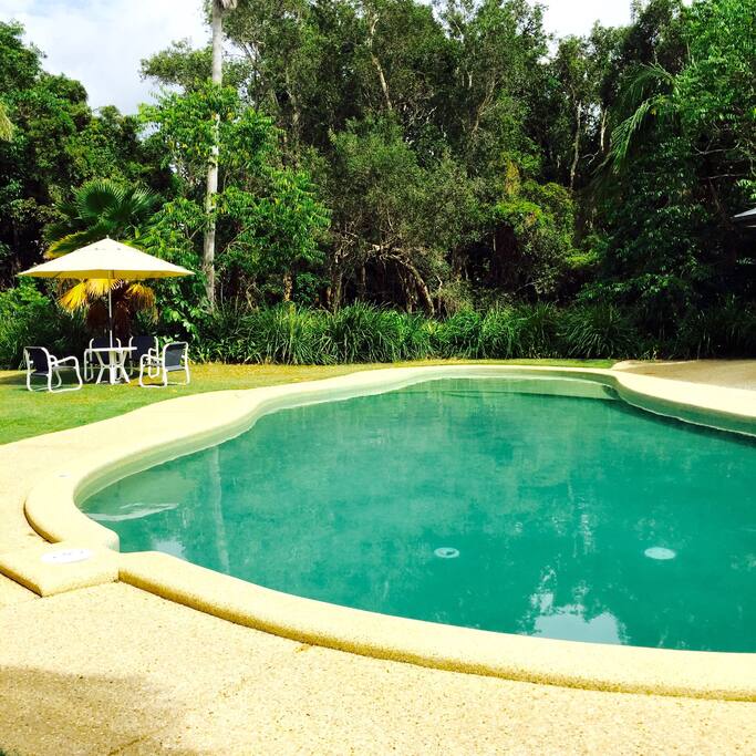 Pools backs on to beautiful greenery and Lilly pond