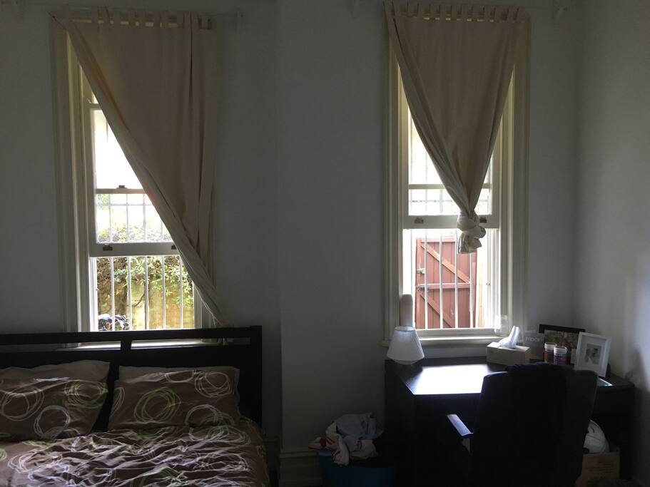 Well lit with two tall windows at the front of the house, curtains block nearly all the sun when required.