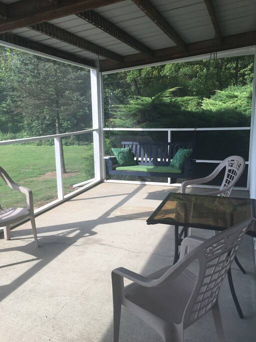 Relax on the screened in porch.