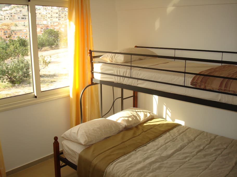 2nd bedroom with double and single bed (bunk style).