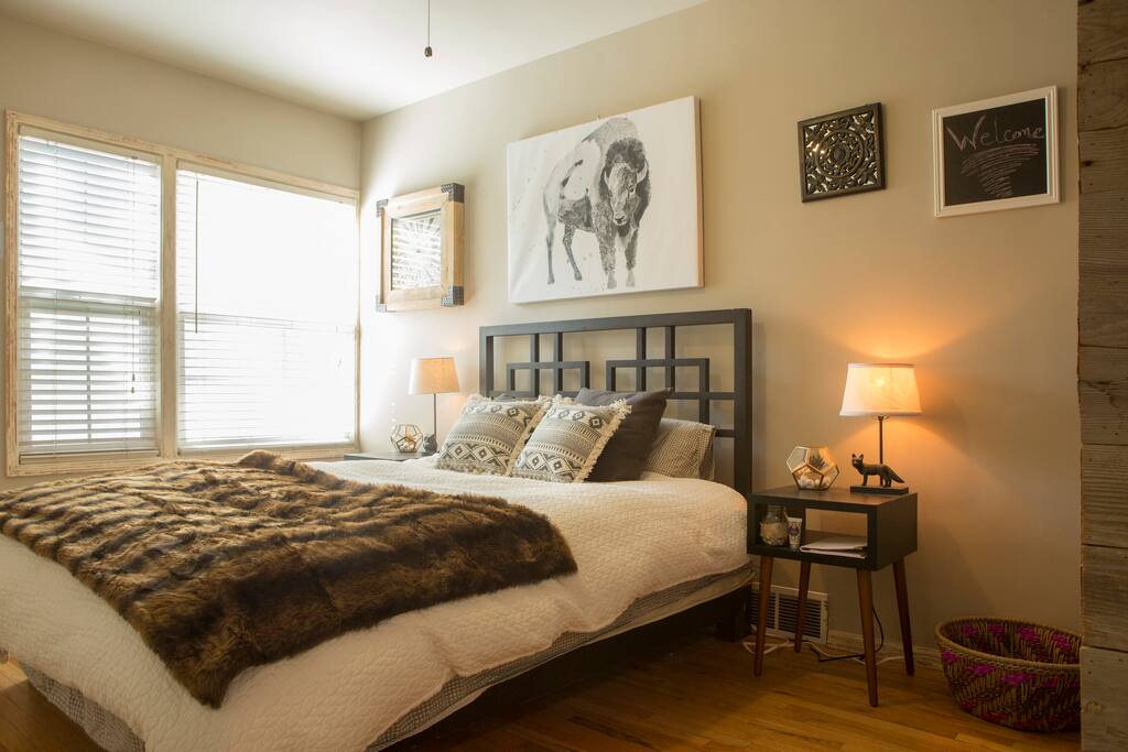 Queen bed with organic sheets and an organic Keetsa mattress. Bed curtesy of West Elm.