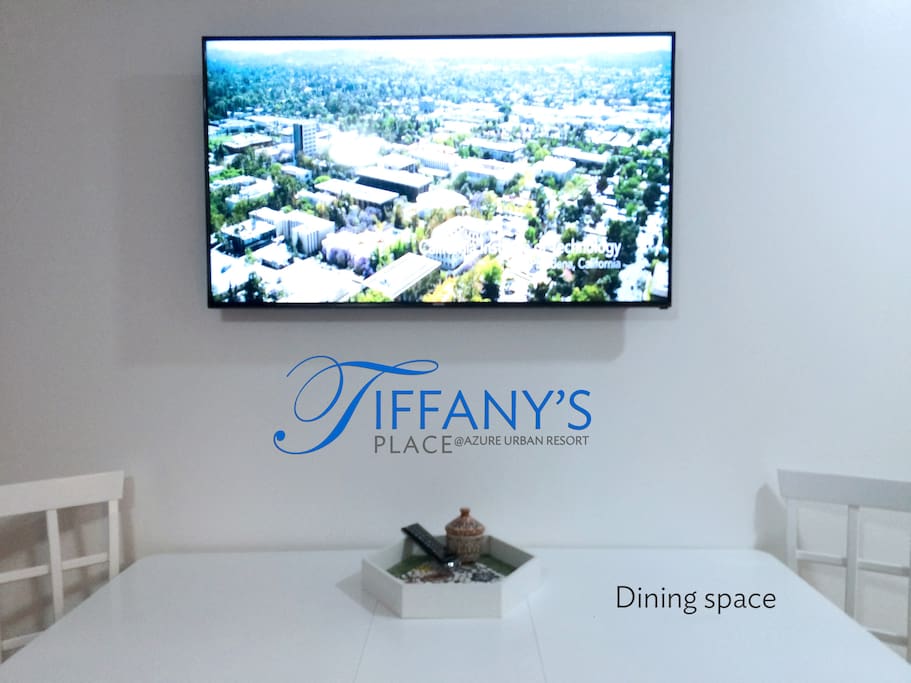 Pristine white dining space with expandable dining table