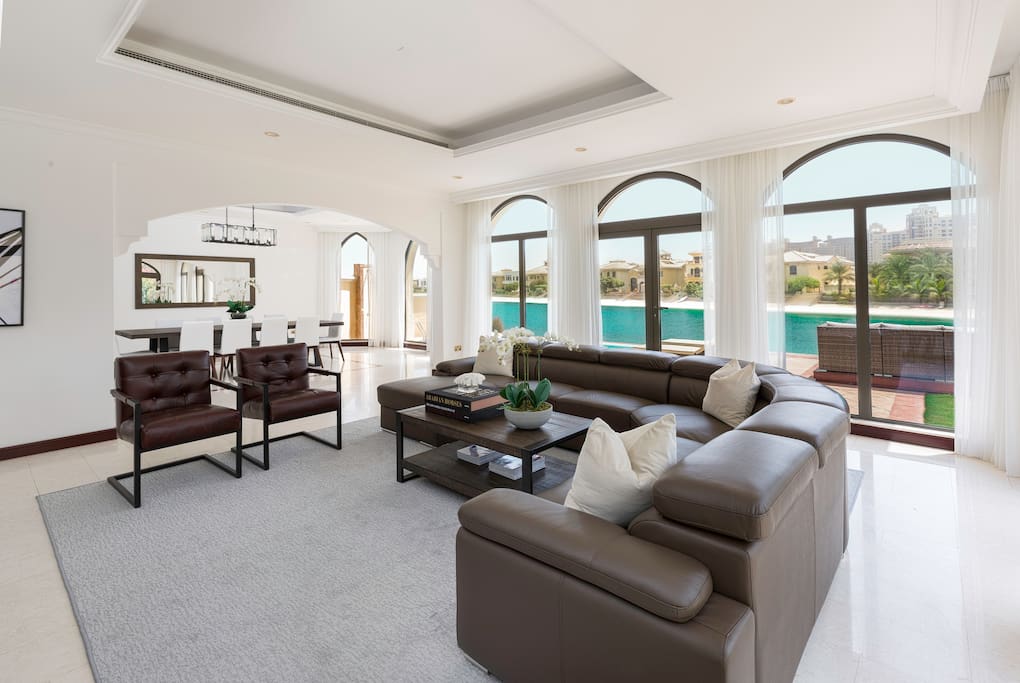 Main living area combines the best of indoor/outdoor living with access to pool, beach and BBQ