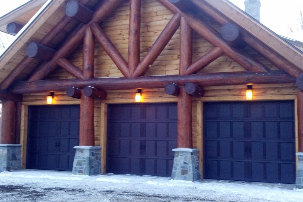 3 car garage with log frame
