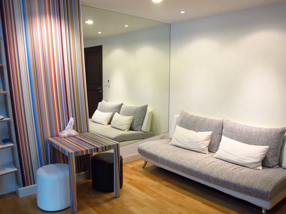 Living room area with Sofa and desk