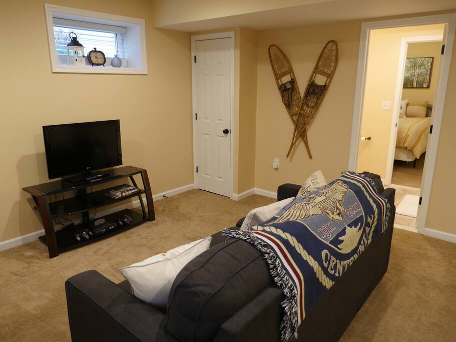 The living room has a pull out queen-size sofa bed. HDTV with an Apple TV to stream all your Netflix favorites and Nintendo 64 for you to use.