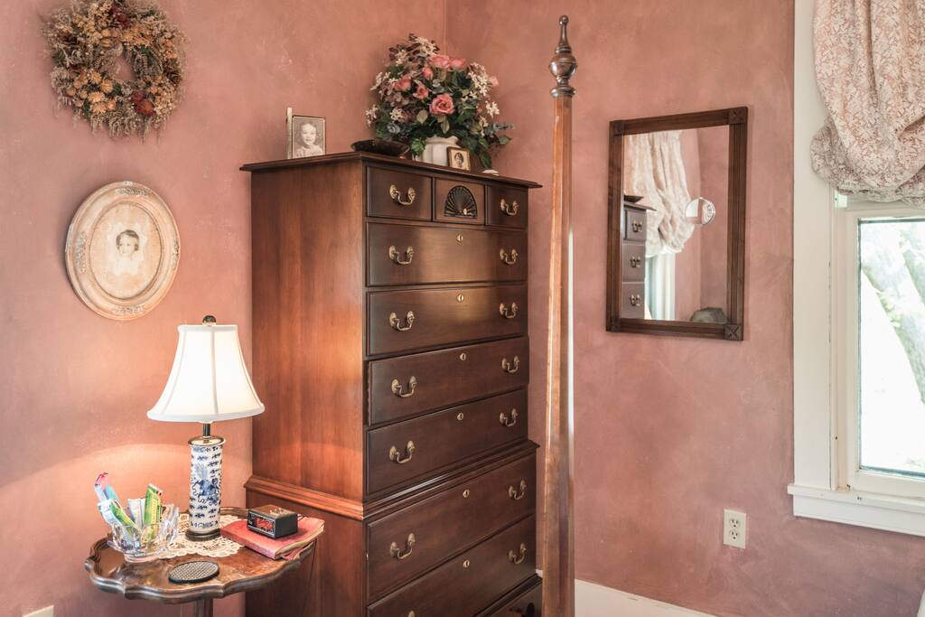 Plenty of room in the dresser for clothes. This room looks out over the back yard.
