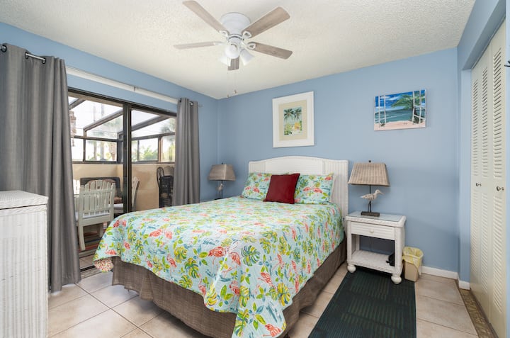 Queen in second bedroom with door to front glassed in sun porch 