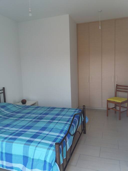 Tall wardrobes in guest bedroom