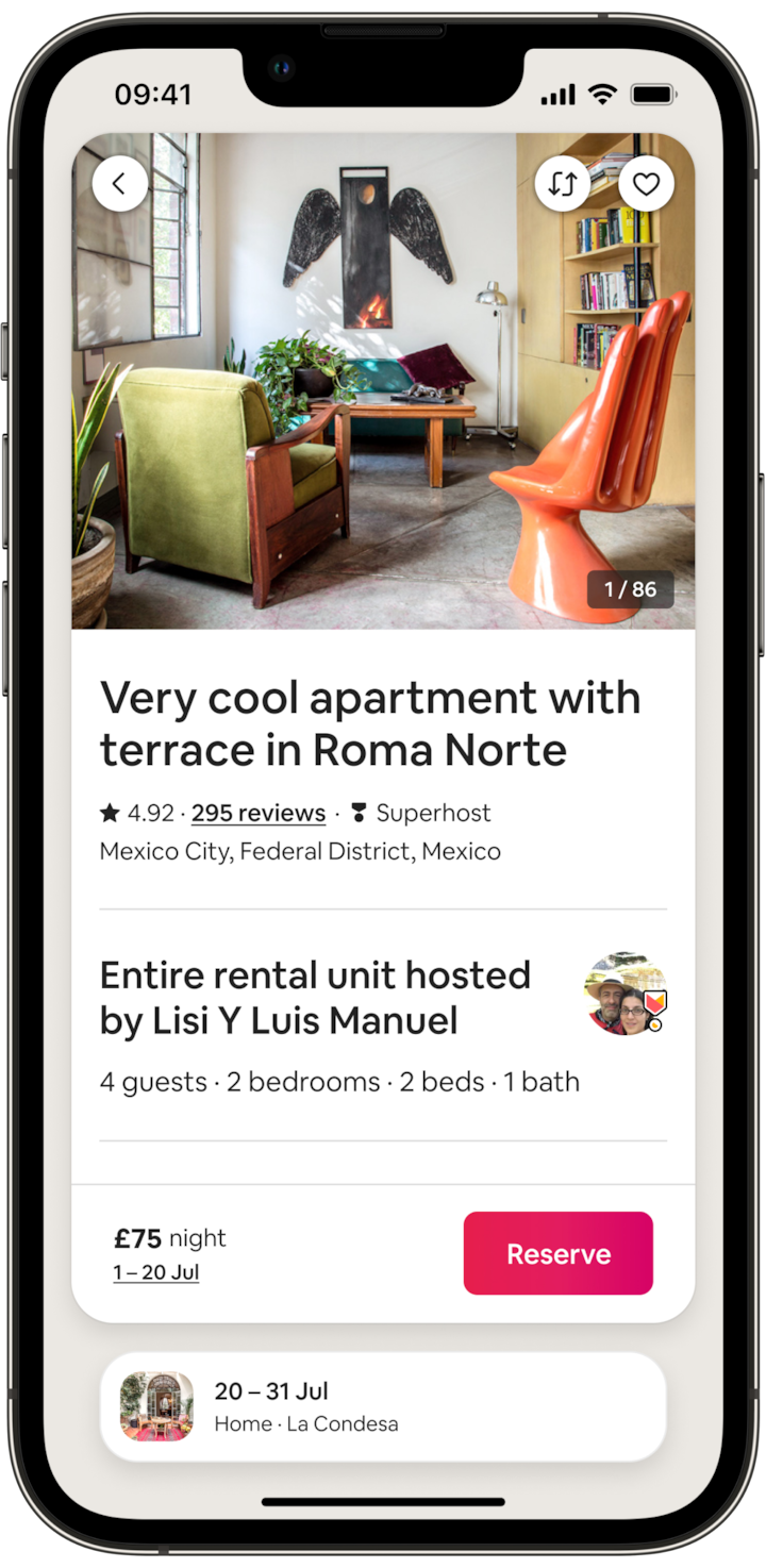 The screen of a mobile phone shows an image of the Roma Norte stay, plus relevant booking information. At the bottom of the screen, there’s a button inviting the guest to “Reserve”.