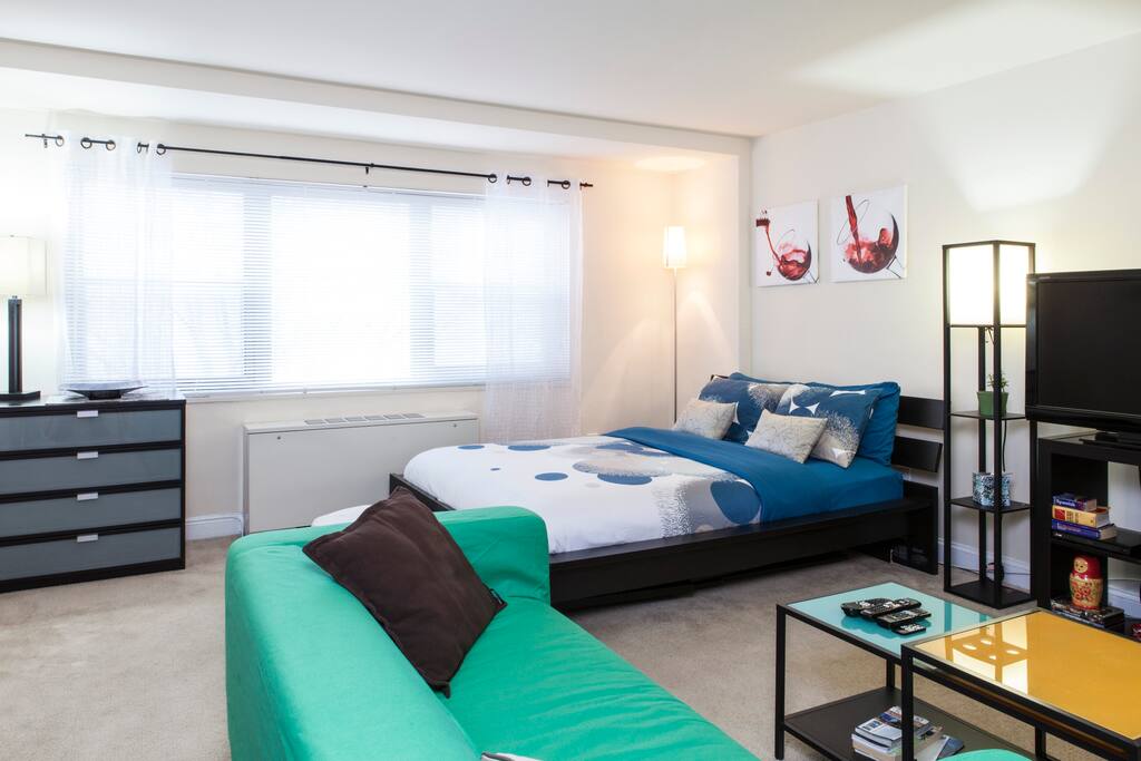 sitting area and the bed from another angle