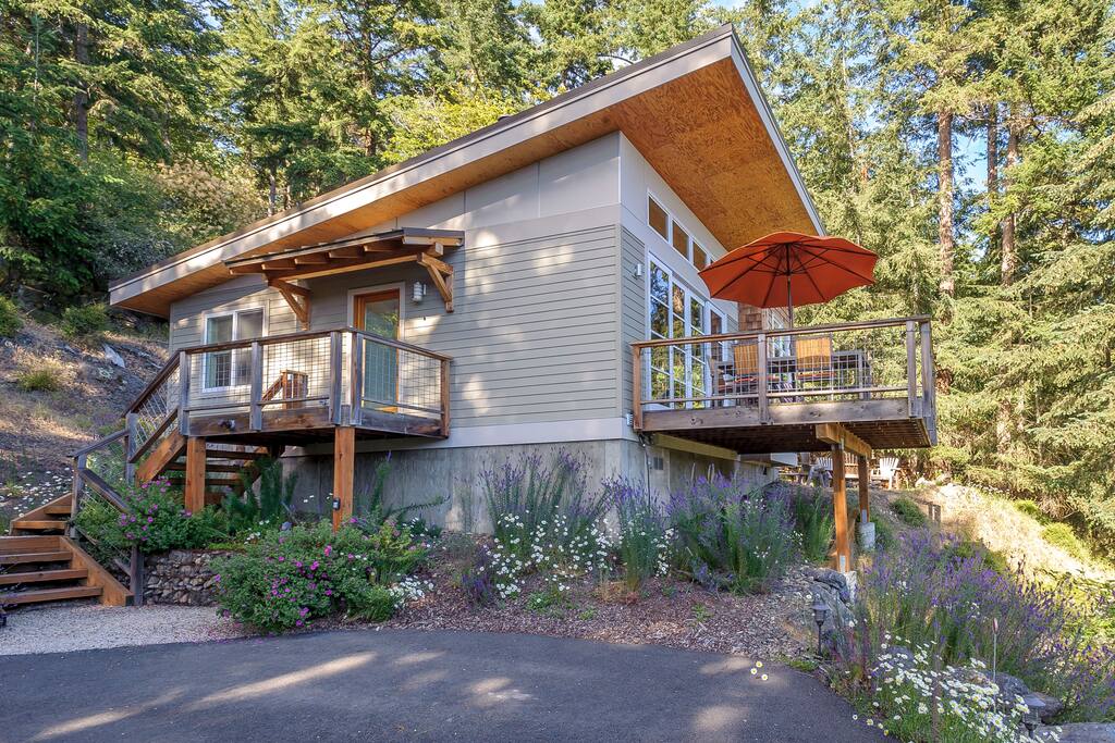 Perch is tucked into the hillside. Wildflowers abound in the summer.