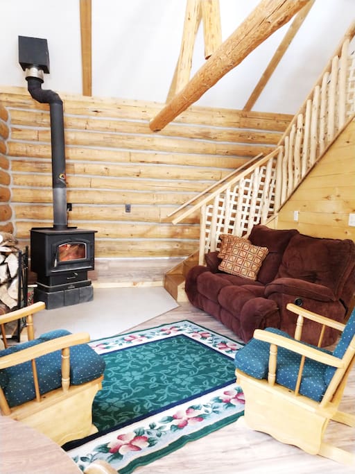 Living Room with Wood Stove but also propane gas heating.