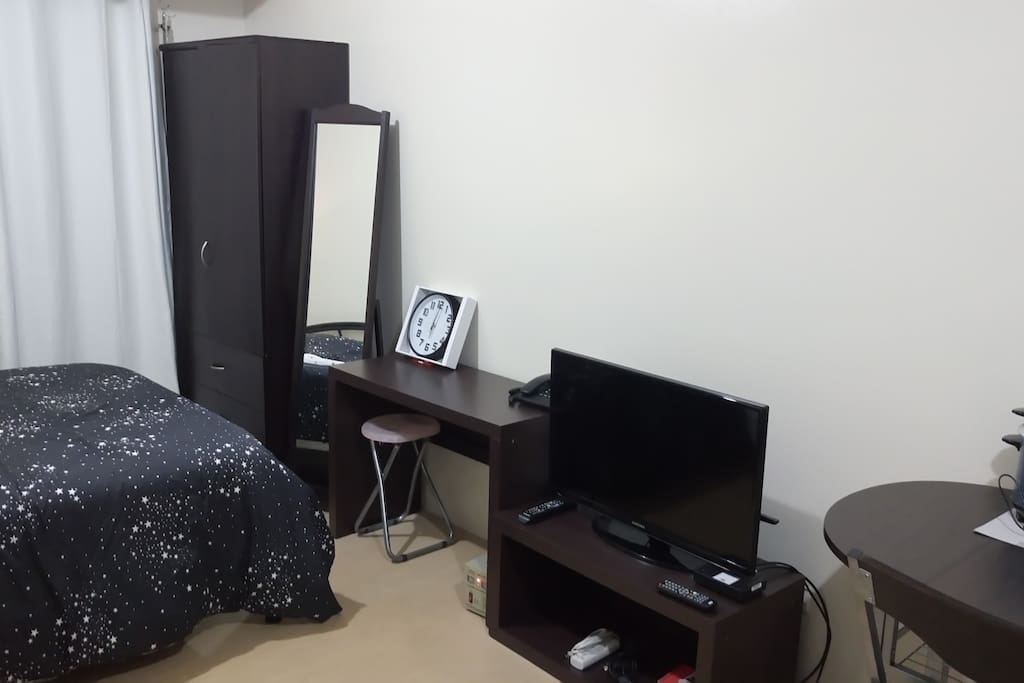 Ample space for your clothes, and a desk if you need to work from home.