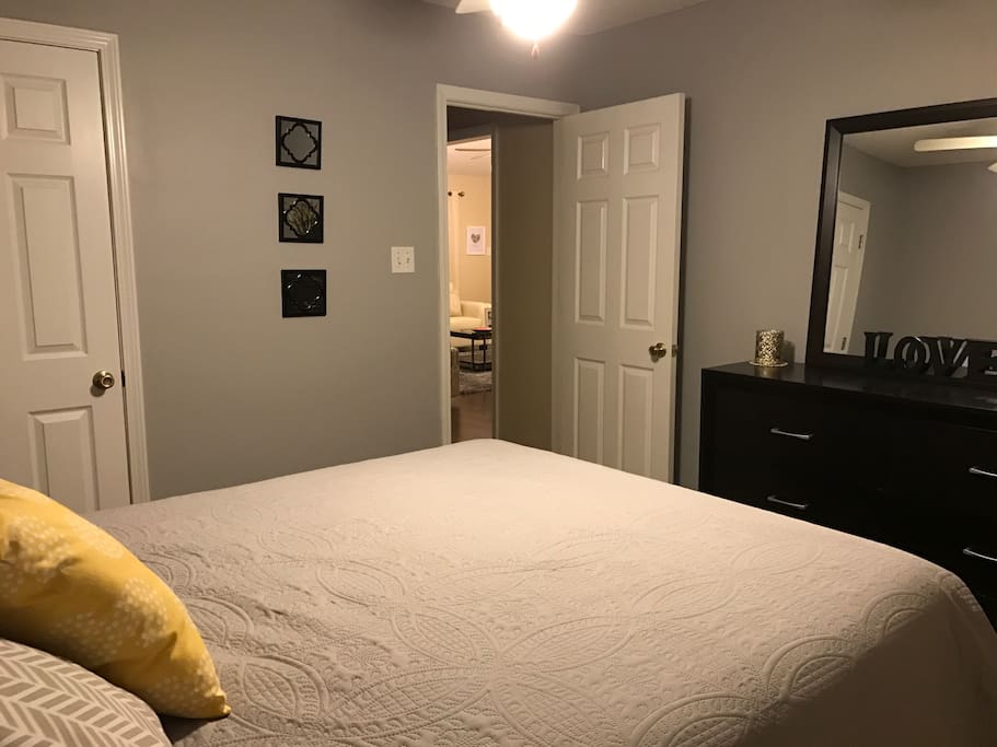 Bedroom with closet and dresser