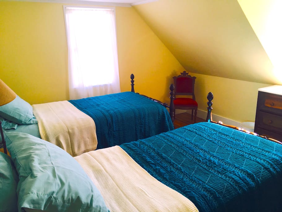 Twin beds in the Yellow Room
