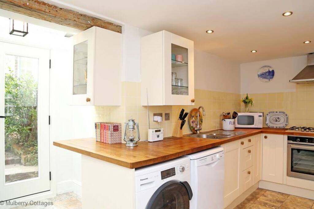 Kitchen includes dishwasher, washing machine, microwave, fridge-freezer, oven and hob. Also dining space