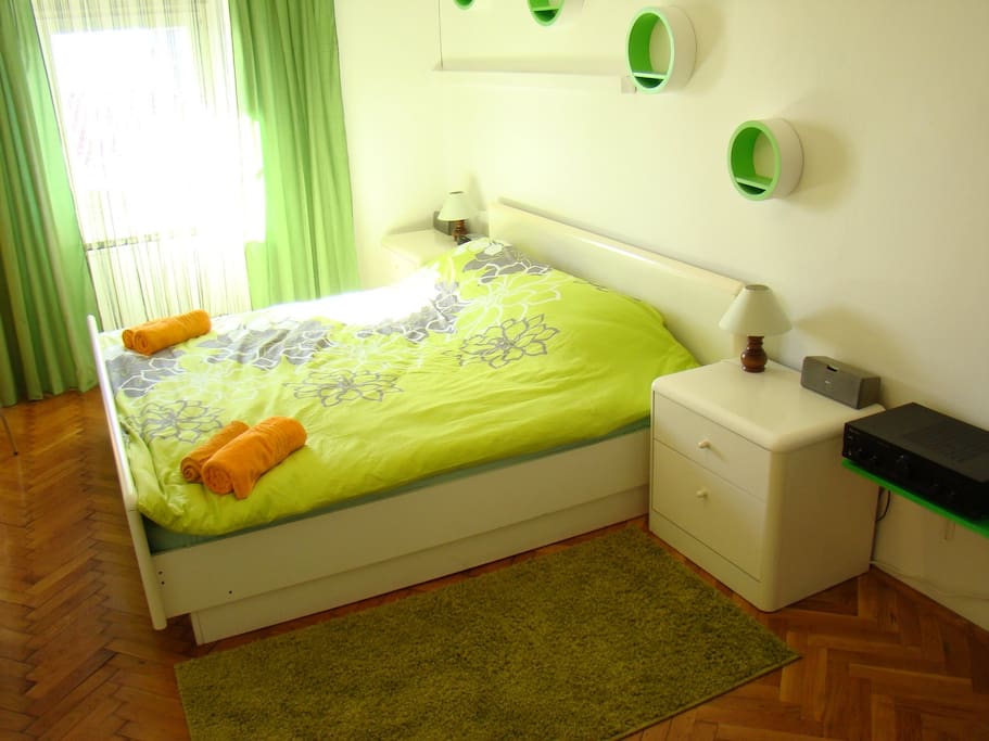 Another bedroom features king size bead nice relaxing green ambient and sound sistem
