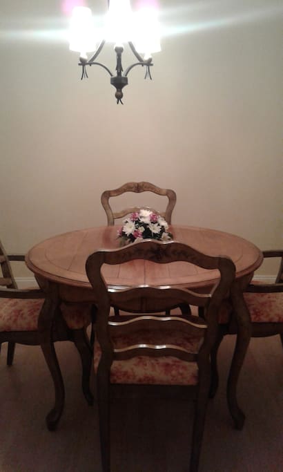 Dining room table and chairs. It does have a leaf to make it larger.