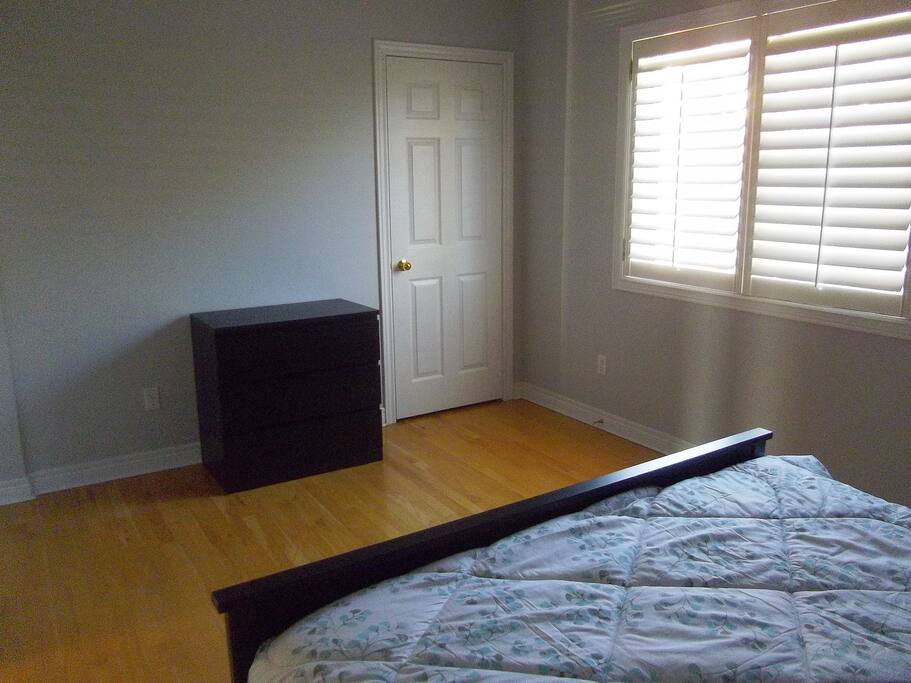 Two large closets and a dresser.