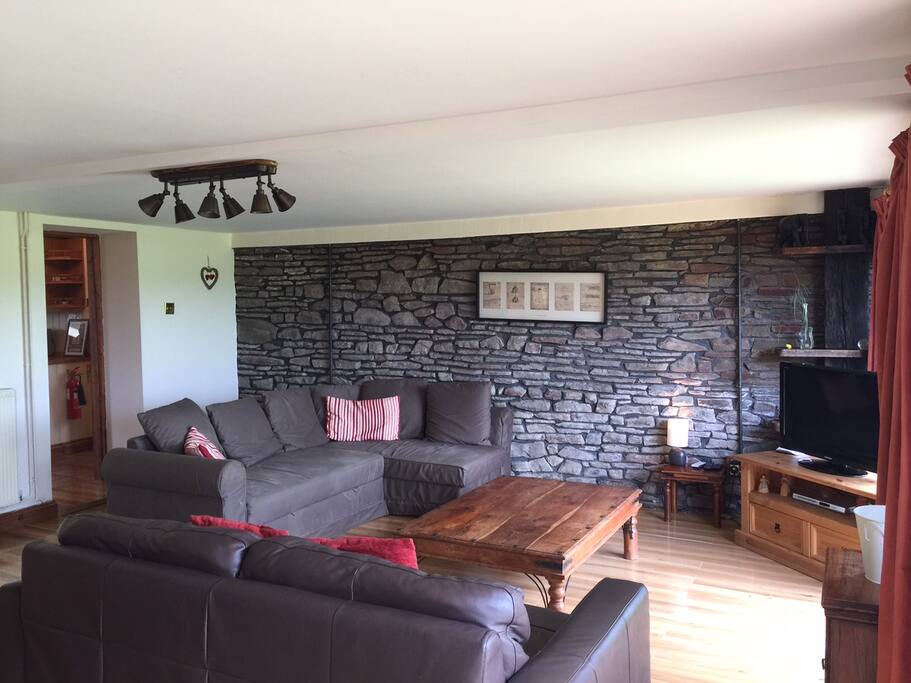 Comfortable lounge with door onto back garden.