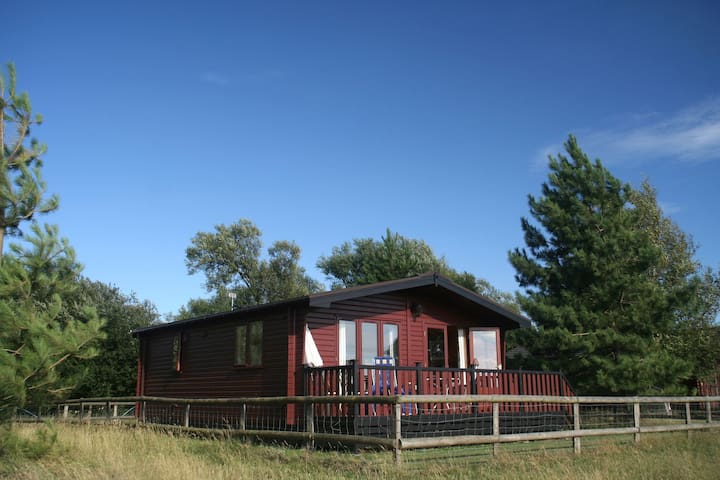 Spacious cottage with sauna looking out on astonishing grasslands