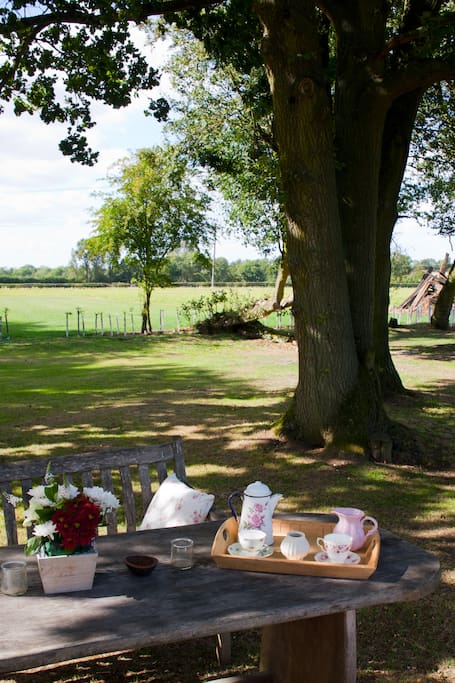Enjoy early morning tea looking over the fields