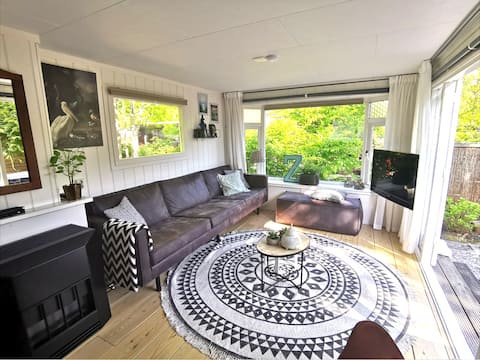 Popular Airbnb listing: Charming Beach house by the sea, on beautiful park in Sint Maartensvlotbrug