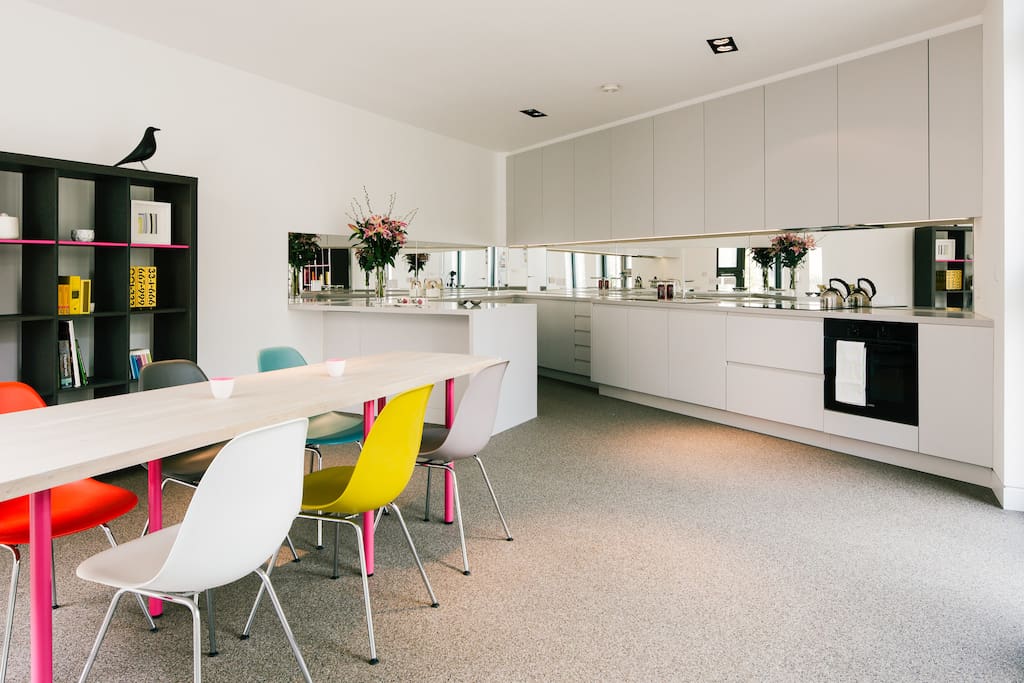 Generous modern kitchen with Corian worktop, breakfast bar and all mod cons