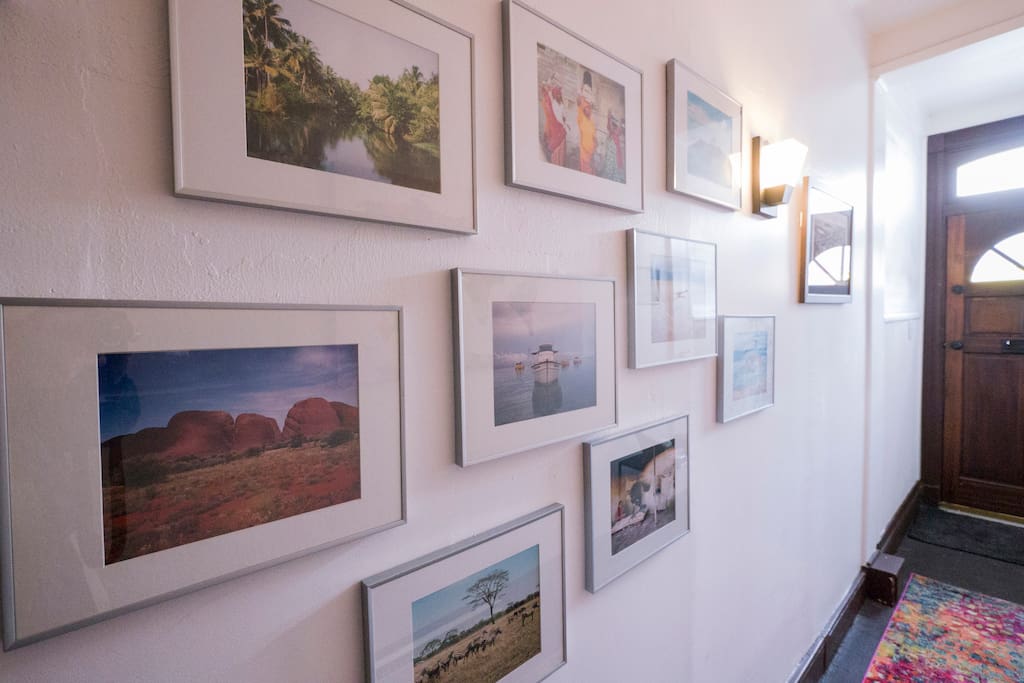 Entrance hall filled with inspirational travel photos.