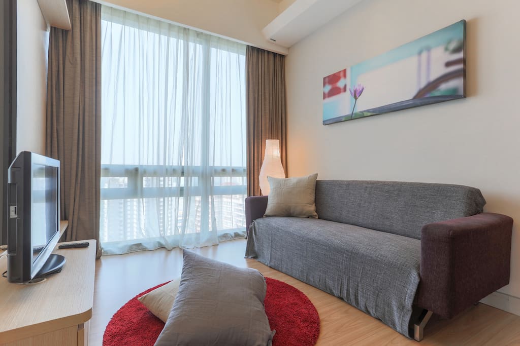 A spacious living room giving one a feeling of peace.