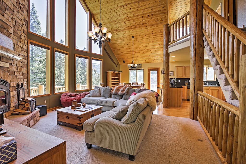 Large windows provide tremendous mountain views while you unwind in the living room.