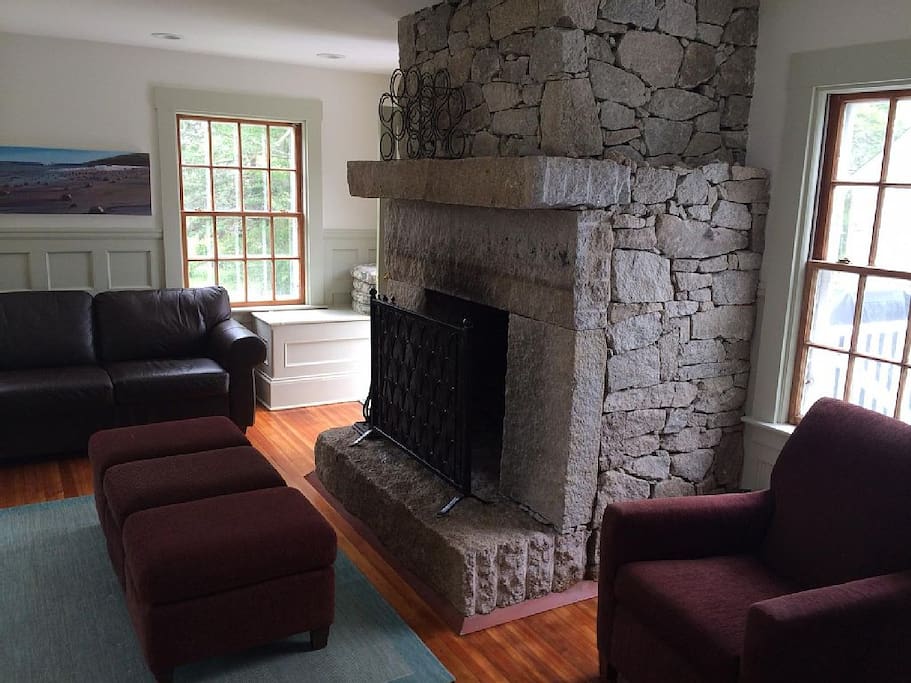 Giant granite fireplace in the kitchen