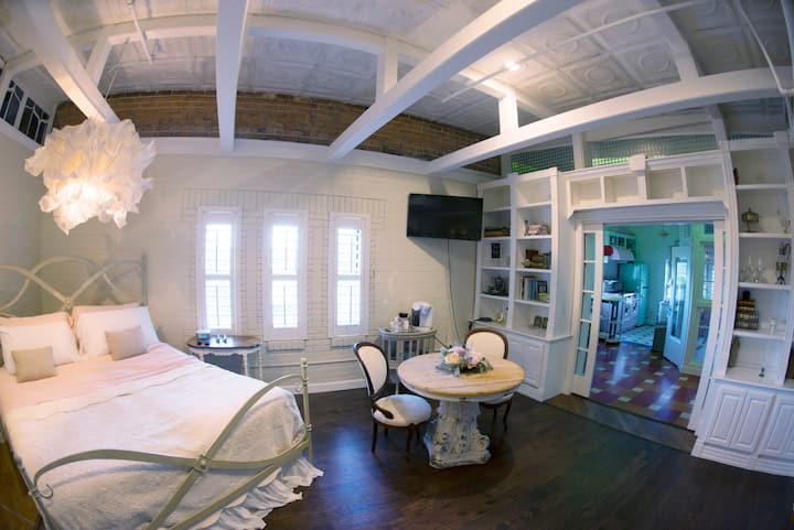 The bedroom in the Commander's suite featuring a queen size sleep number bed with individual adjustment and powered incline/recline options