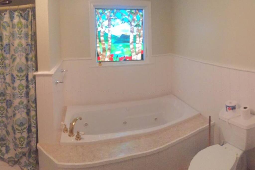 Remodeled bath with jacuzzi spa tub