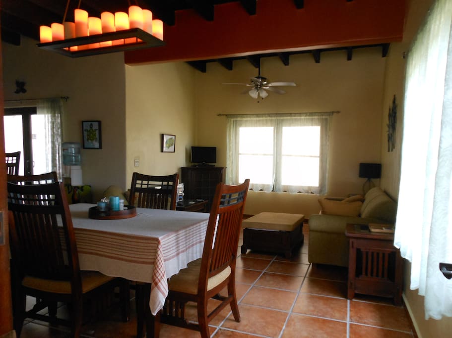 Dining, living room, kitchen patio.