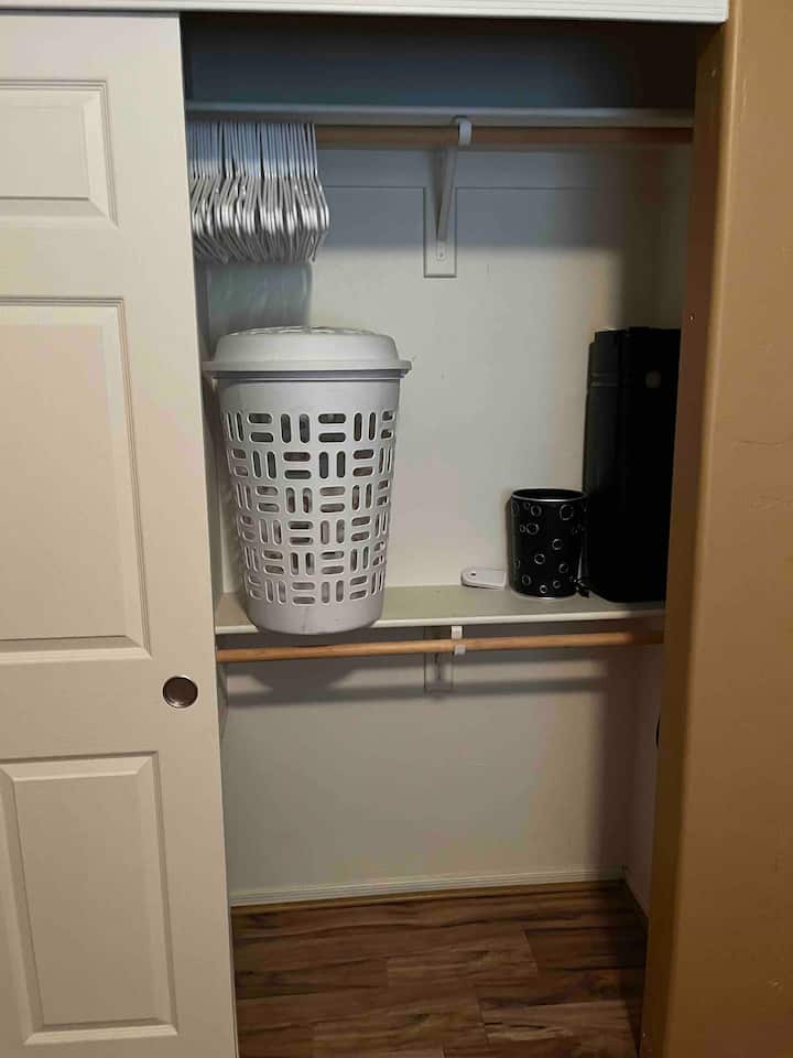 bedroom 2 laundry, trash, drawer, hangers, air filter/white noise fan, Himalayan salt lamp, luggage rack
