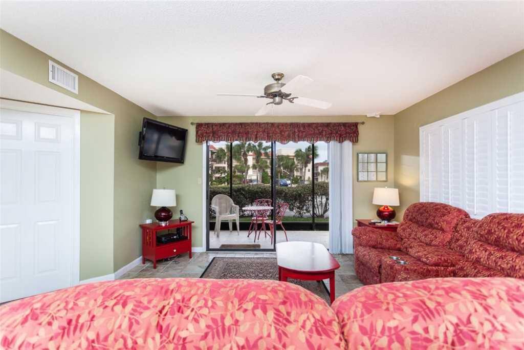 Spacious Living Room - Large comfortable couches, cable HDTV, and ceiling fan so you can enjoy your evenings with family and lots