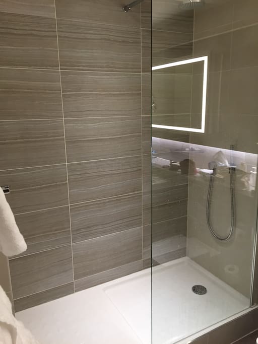 The bathroom has recently been rebut bushed and is now an over sized walk in shower ! Very bright and modern
