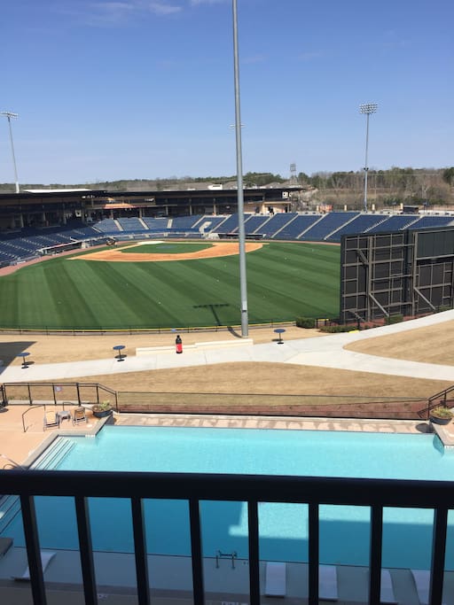 This is the view from the balcony overlooking a saltwater pool and the Gwinnett Braves
