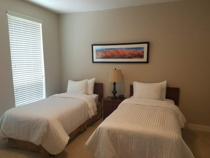One bedroom in an upscale apartment
