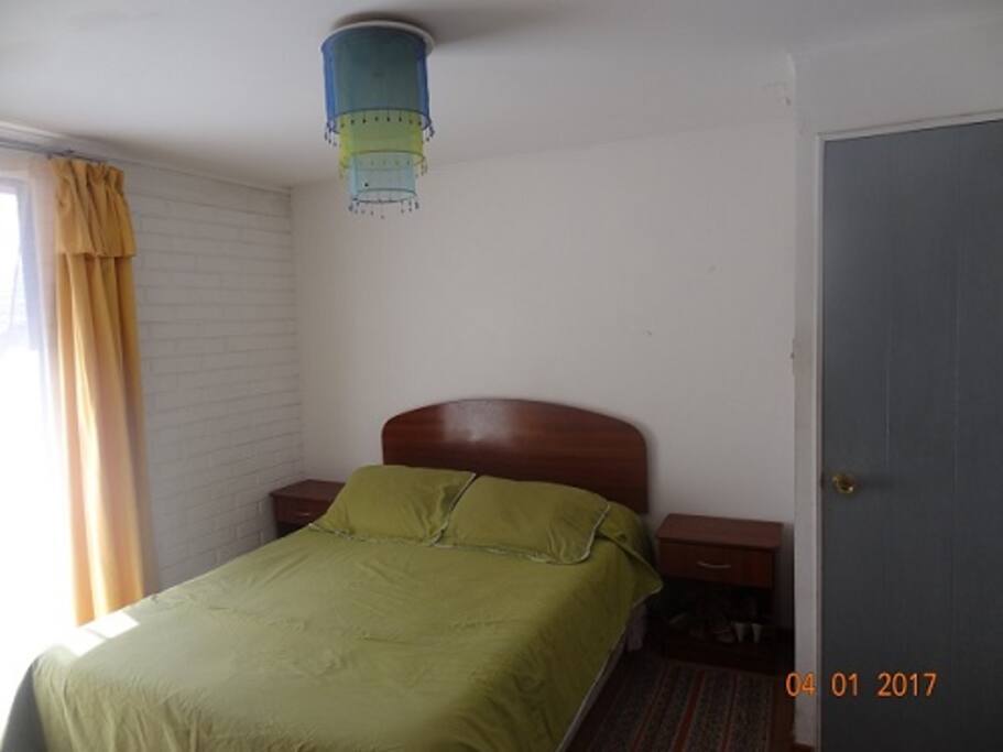 Dormitorio matrimonial con baño en suite
