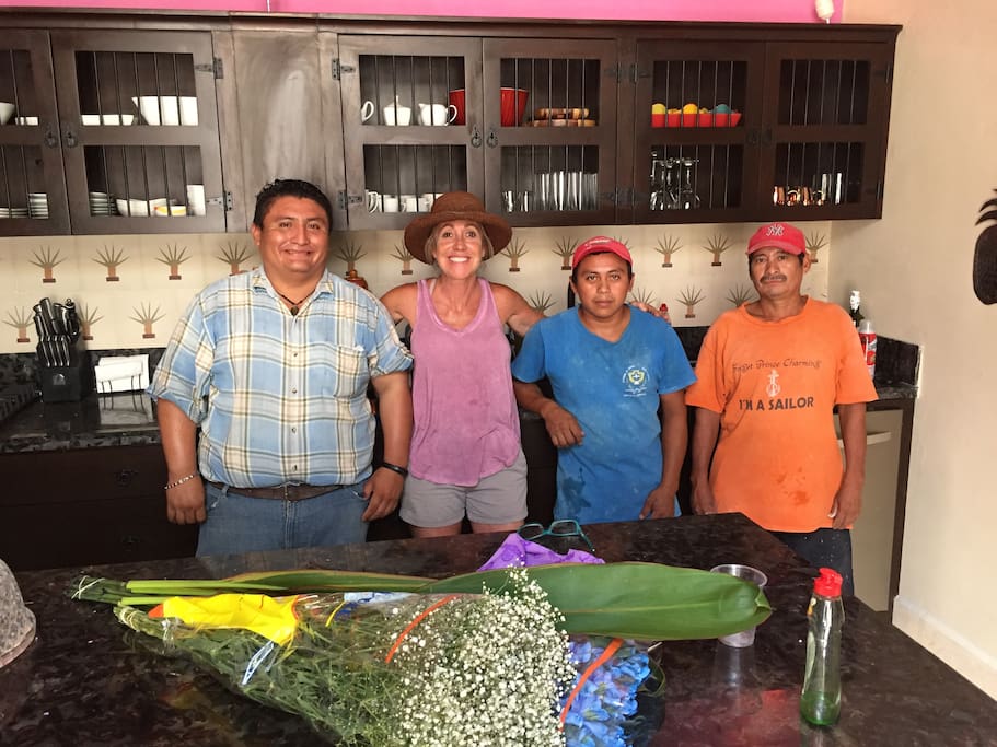 Owner ( Margie) with workers during remodel in 2017