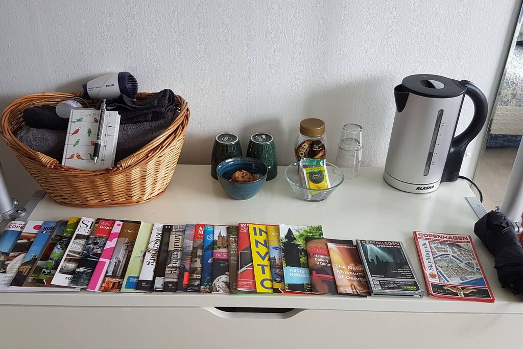 Towels, the, coffee, hair dryer and tourists guides.