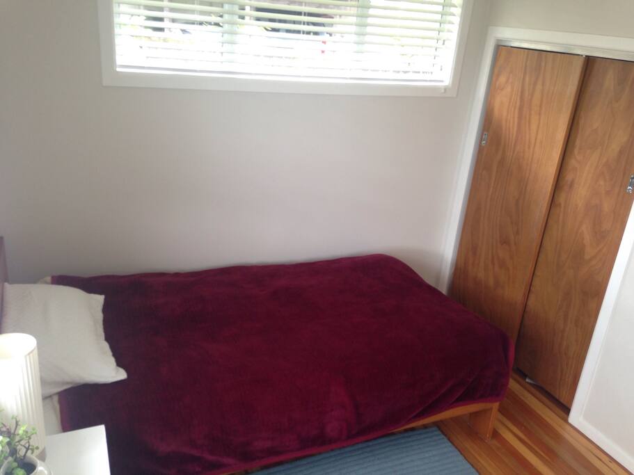 Single bed and wardrobe