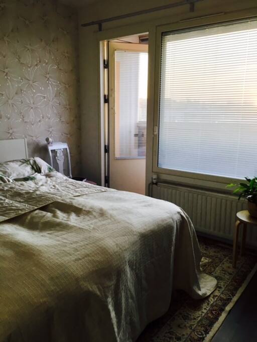 Master bedroom, direct access to balcony.