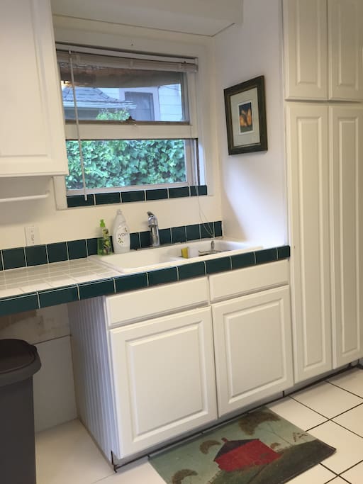 Well equipped kitchen- stove, microwave, fridge, pantry, essentials.