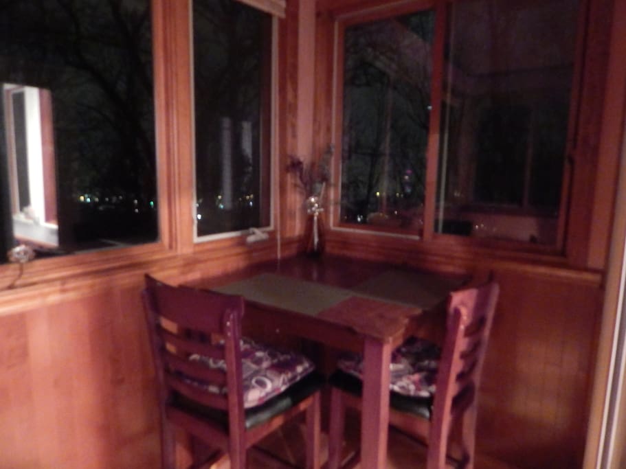 Private adjoining room gives you visual access to the city lights of Asheville.