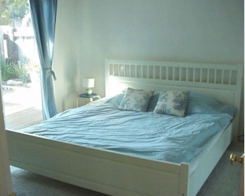 Master Bedroom with deck to backyard deck